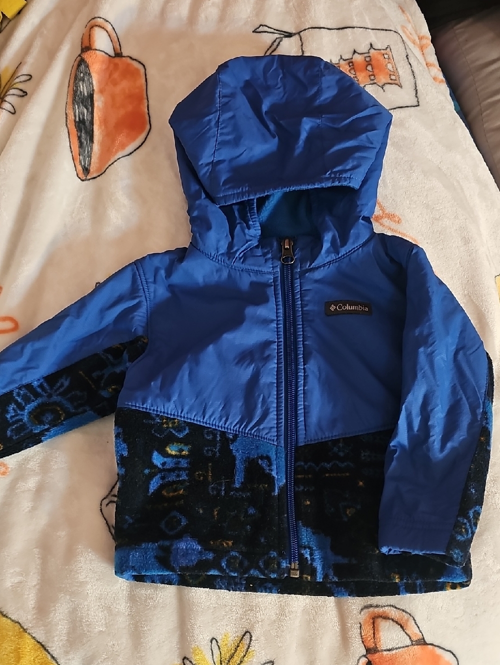 Columbia Blue Hooded Jacket with Black Logo Patch